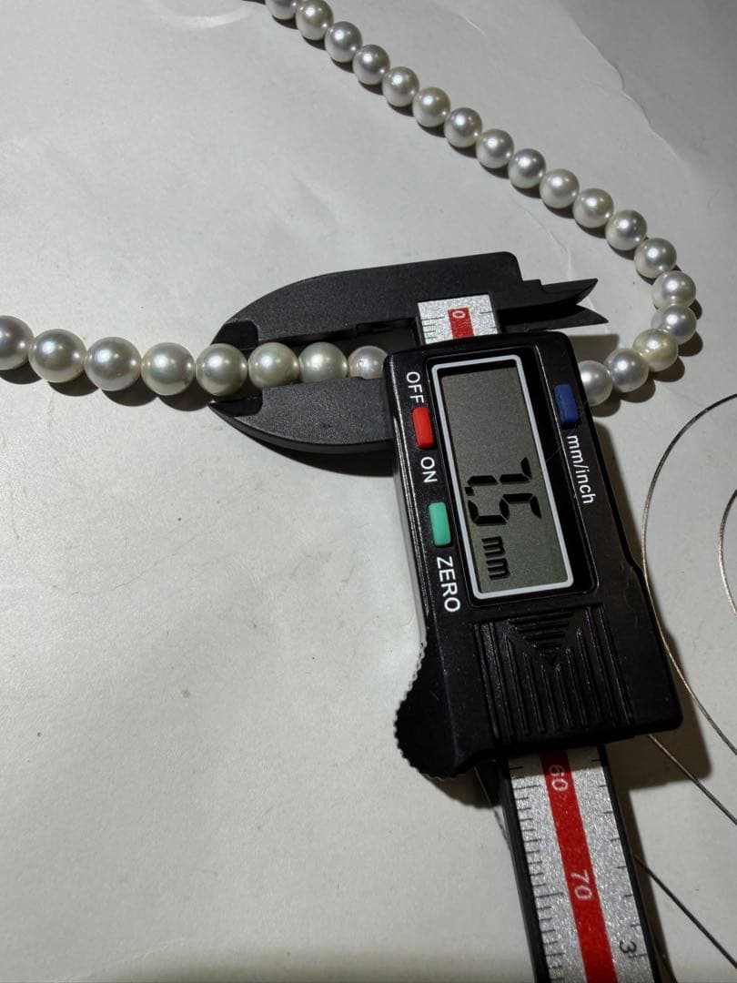 Akoya seawater pearl necklace with 7.5mm blue-gray pearls and silver color clasp