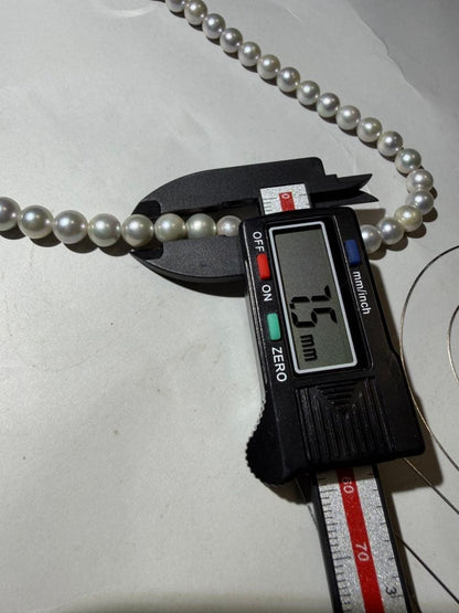 Akoya seawater pearl necklace with 7.5mm blue-gray pearls and silver color clasp