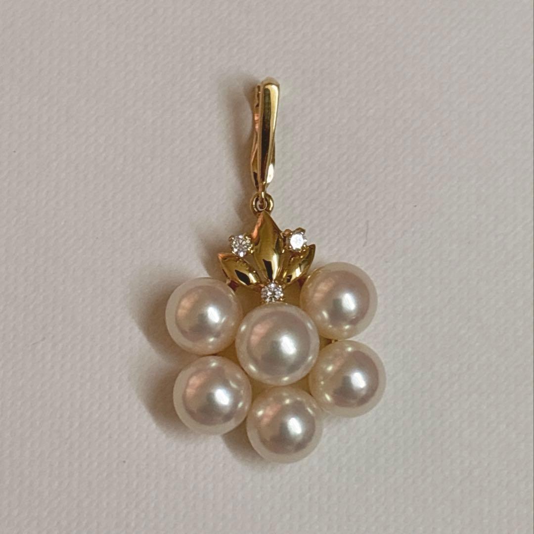 Mikimoto K18 gold pendant top featuring a 6.5-7mm pearl and diamond accents with detailed bail