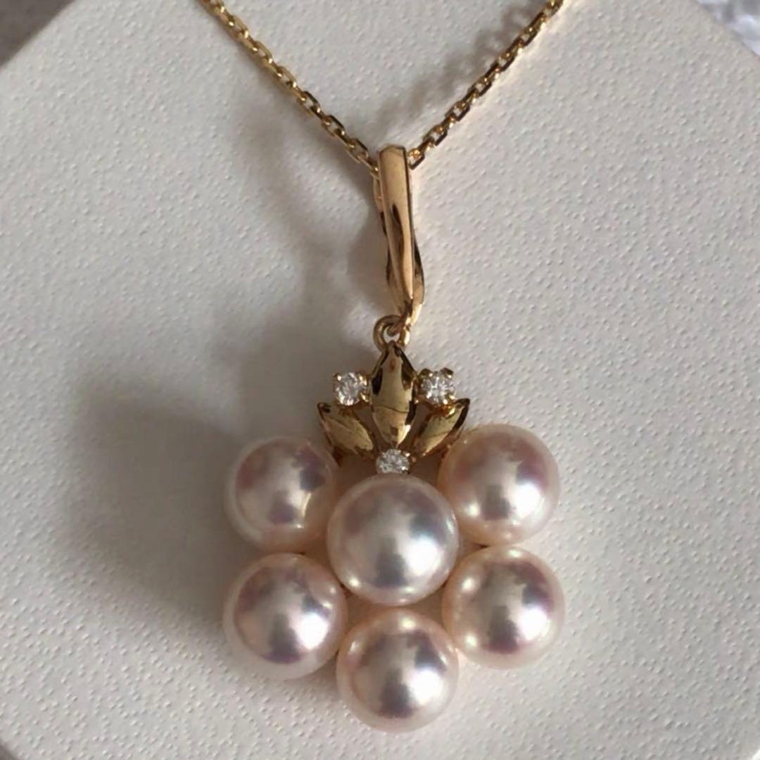 Mikimoto K18 gold pendant top featuring a 6.5-7mm pearl and diamond accents with detailed bail