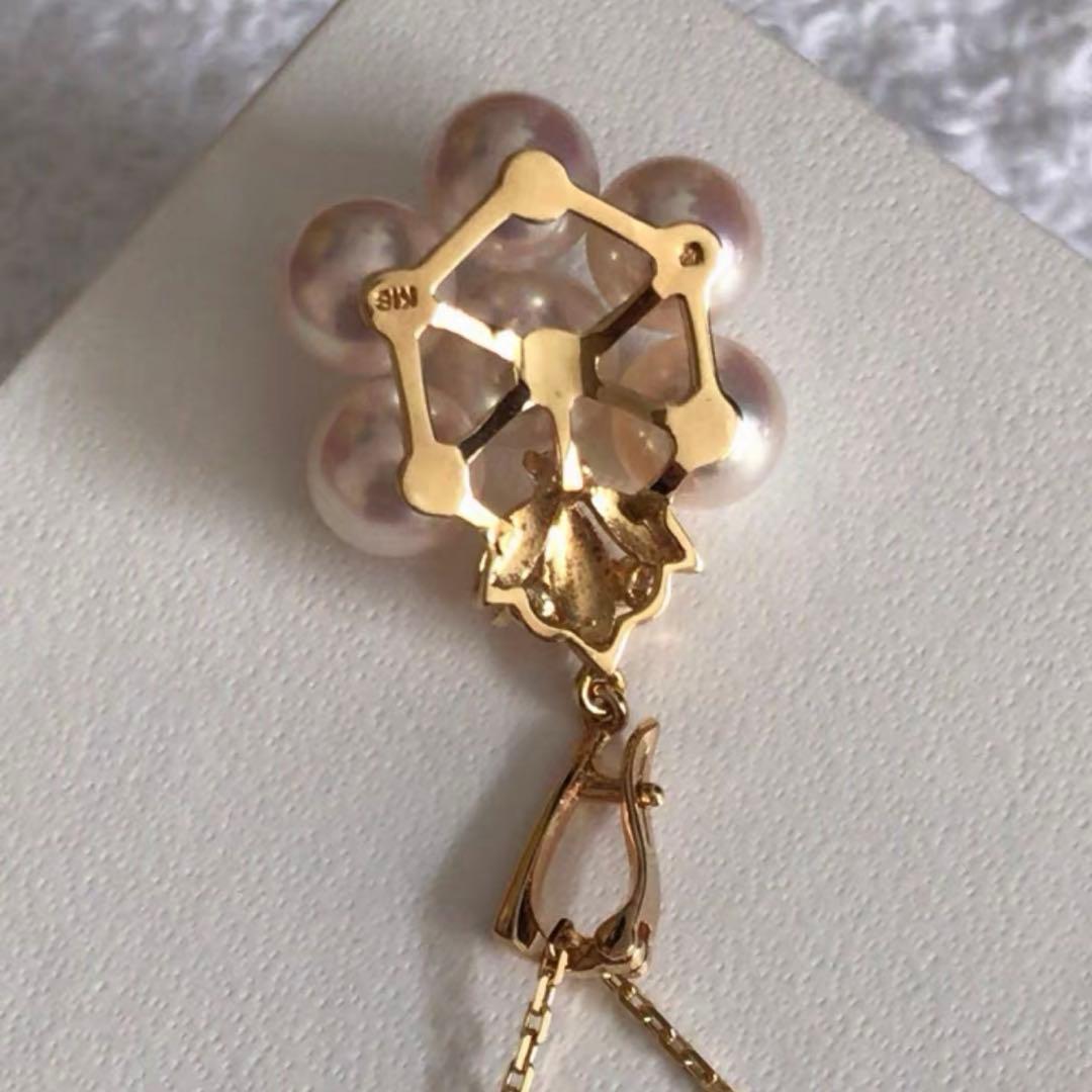 Mikimoto K18 gold pendant top featuring a 6.5-7mm pearl and diamond accents with detailed bail
