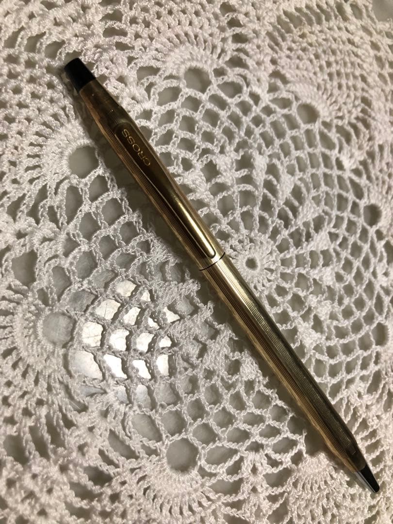 Vintage CROSS ballpoint pen in gold filled with black ink and matching case measuring 13.4 cm