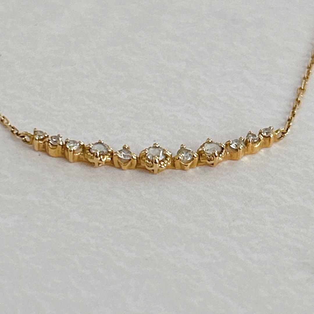agete K18 gold necklace with 0.09 carat diamonds and 40 cm chain on white background