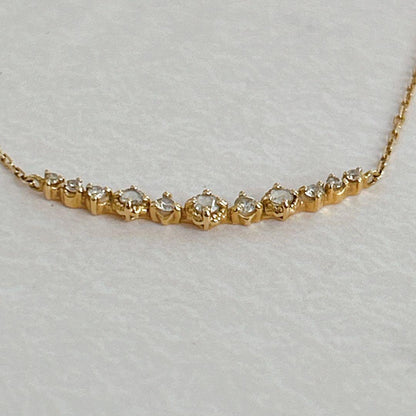 agete K18 gold necklace with 0.09 carat diamonds and 40 cm chain on white background