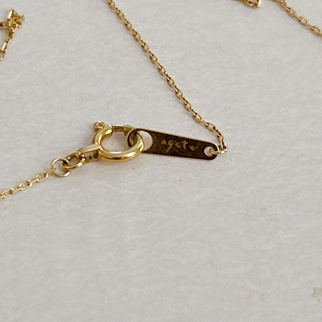 agete K18 gold necklace with 0.09 carat diamonds and 40 cm chain on white background