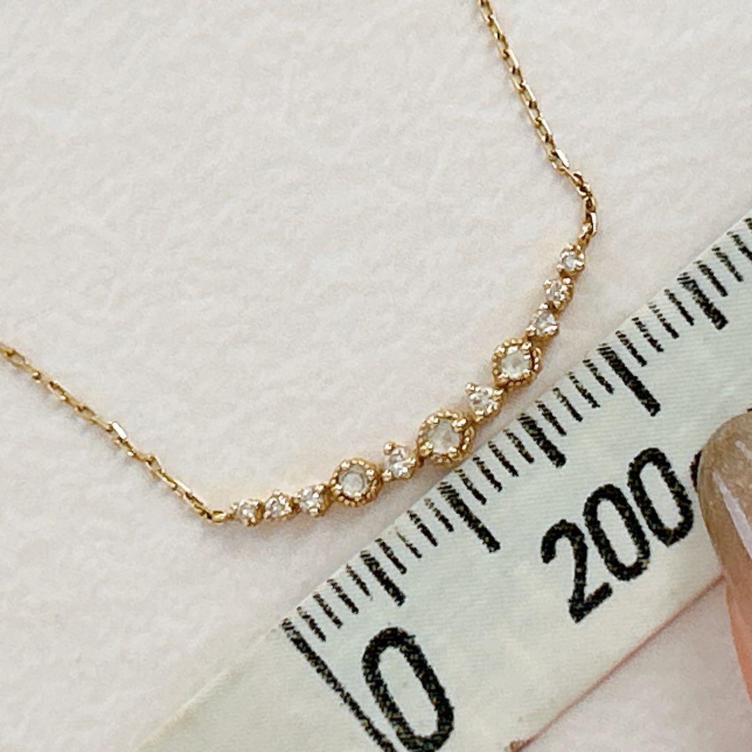 agete K18 gold necklace with 0.09 carat diamonds and 40 cm chain on white background