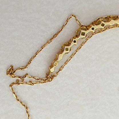 agete K18 gold necklace with 0.09 carat diamonds and 40 cm chain on white background