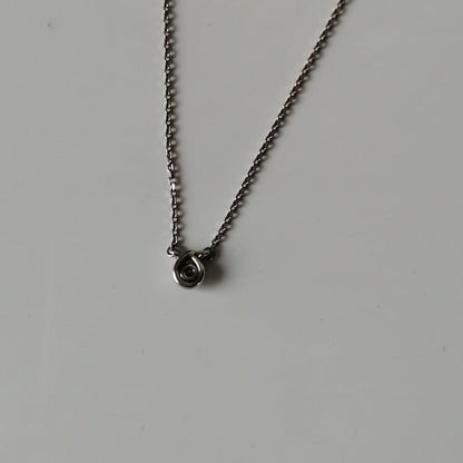 agete necklace with drop motif and transparent stone on a 40 cm chain displayed on white background