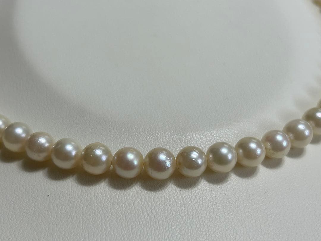 Akoya pearl necklace with 6-6.5mm pearls, 42cm length, silver clasp, slight looseness in string