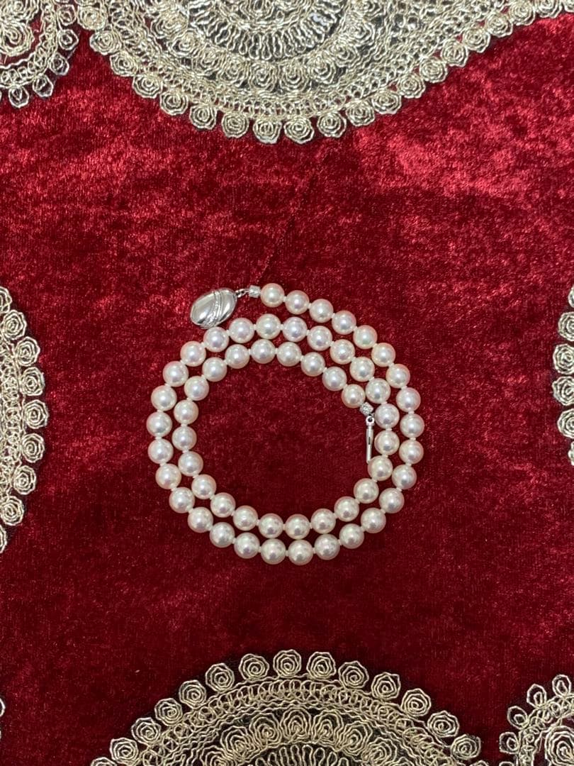 Akoya pearl necklace with 57 round 7mm pearls measuring 45cm length in pristine condition