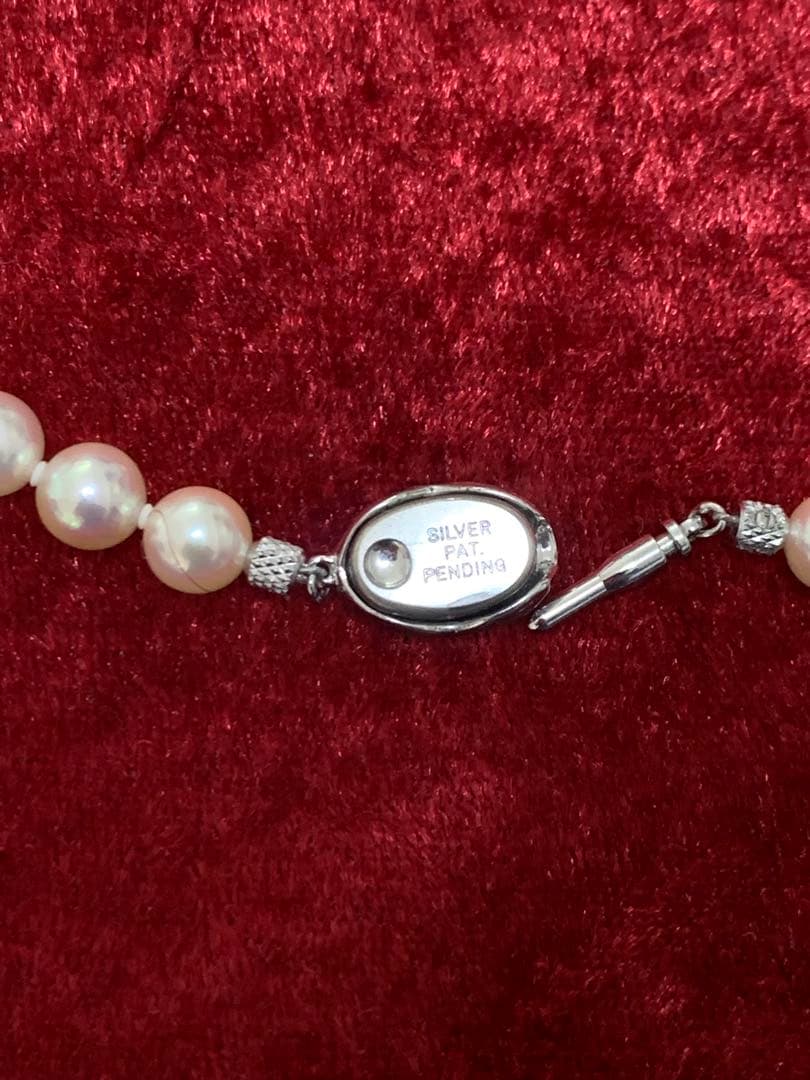 Akoya pearl necklace with 57 round 7mm pearls measuring 45cm length in pristine condition