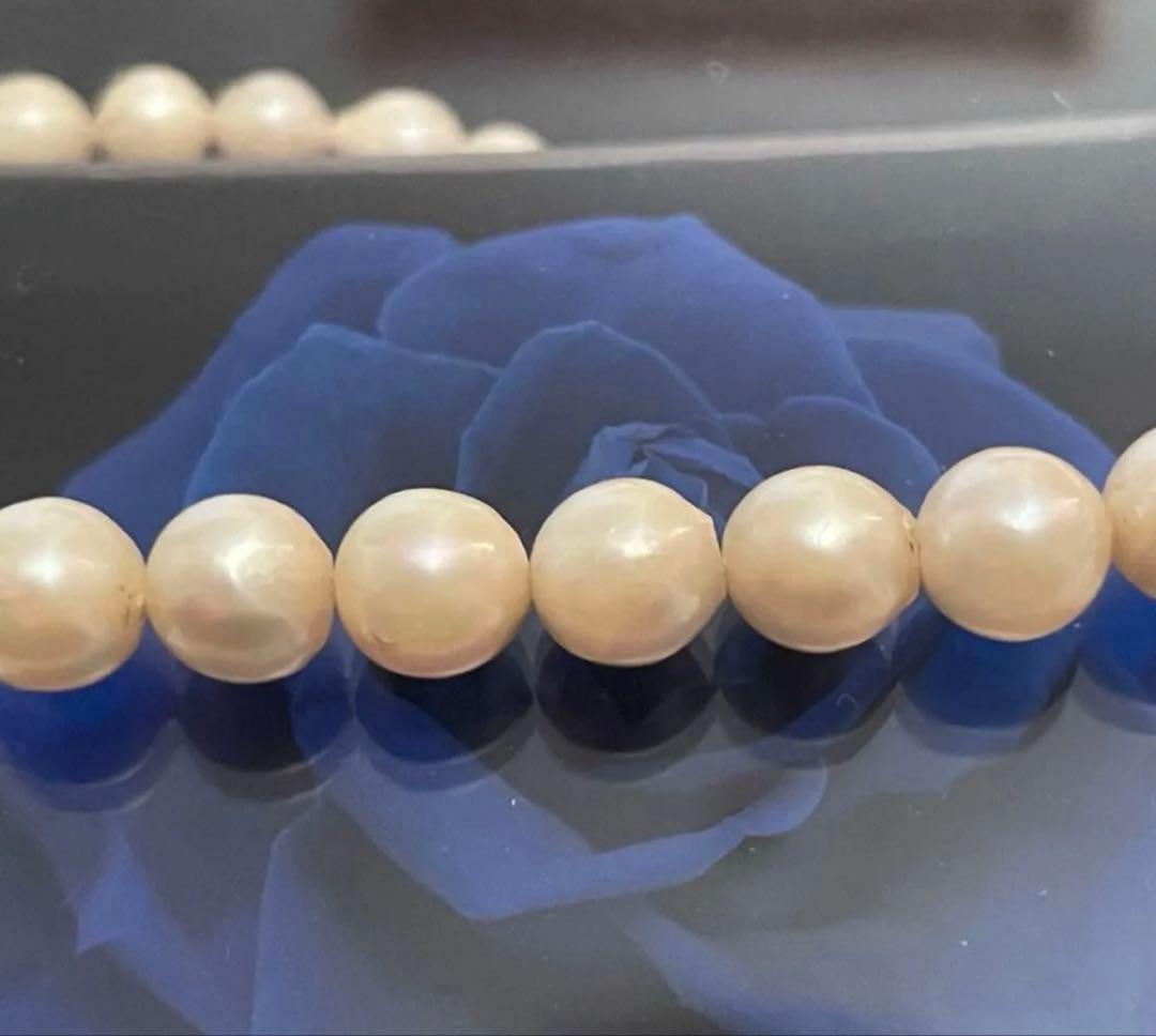 Vintage Akoya pearl necklace with 7.5mm semi-baroque cream-white pearls and silver clasp, 38cm length choker
