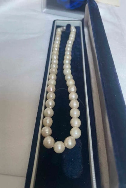 Vintage Akoya pearl necklace with 7.5mm semi-baroque cream-white pearls and silver clasp, 38cm length choker