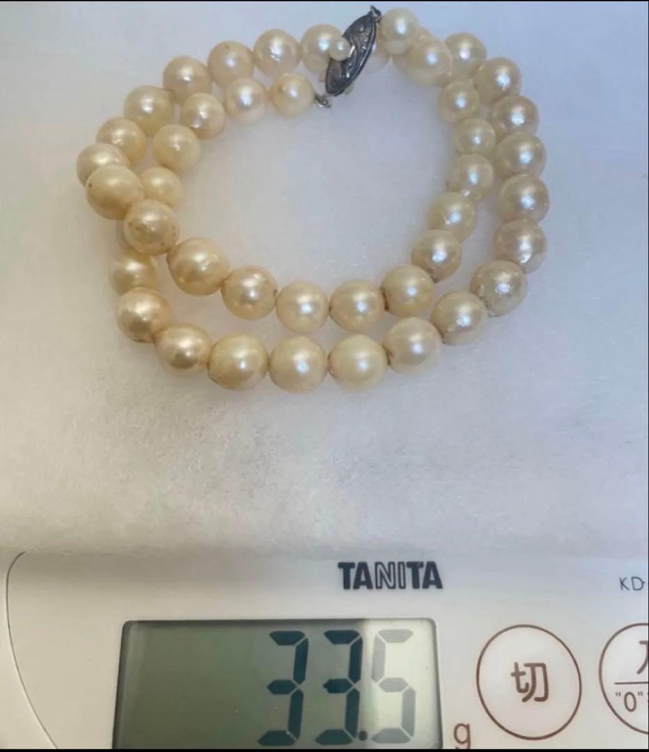 Vintage Akoya pearl necklace with 7.5mm semi-baroque cream-white pearls and silver clasp, 38cm length choker