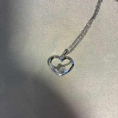 Mikimoto silver necklace featuring a 6.5mm pearl set in a heart-shaped motif pendant on a 40cm chain