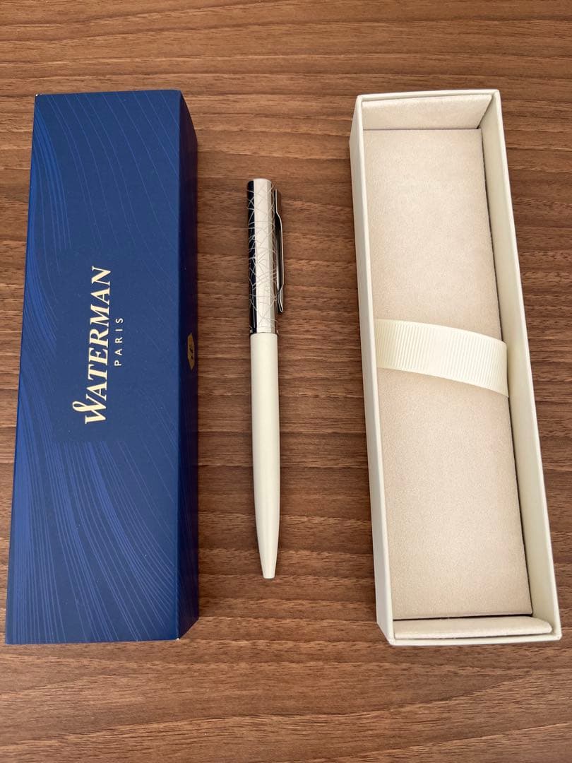 Waterman click ballpoint pen with silver and white design, unused condition