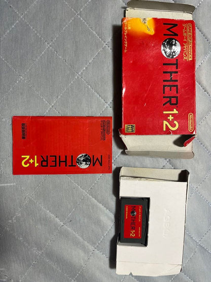 MOTHER1+2 used Game Boy Advance SP game cartridge with visible box scratches