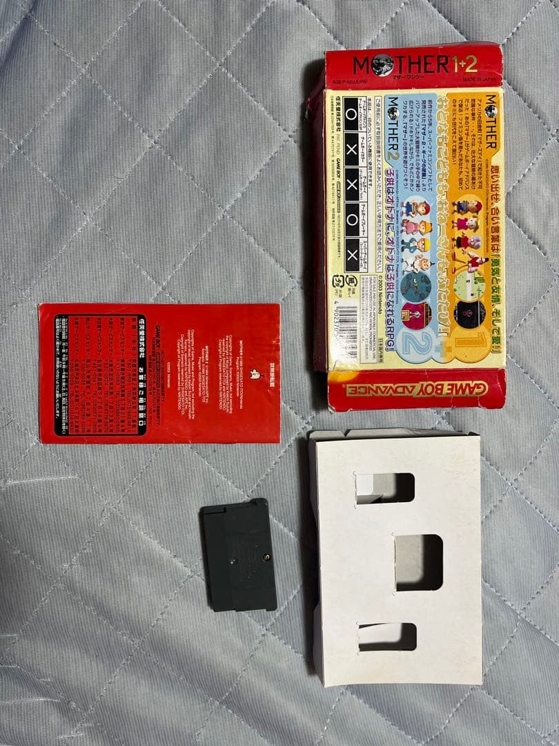 MOTHER1+2 used Game Boy Advance SP game cartridge with visible box scratches
