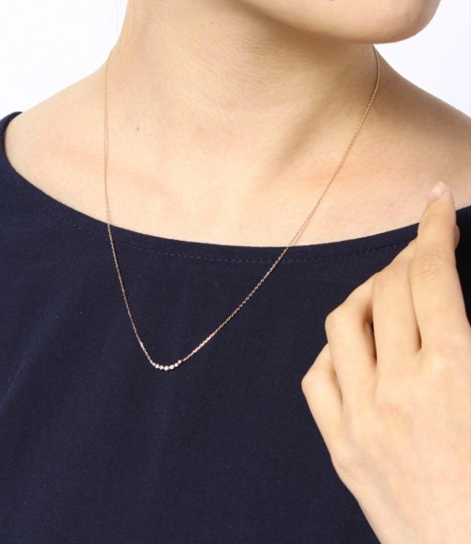 Agete K18 0.1ct diamond necklace with 45 cm ball chain displayed with case and certificate