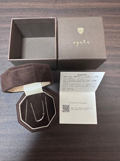 Agete K18 0.1ct diamond necklace with 45 cm ball chain displayed with case and certificate
