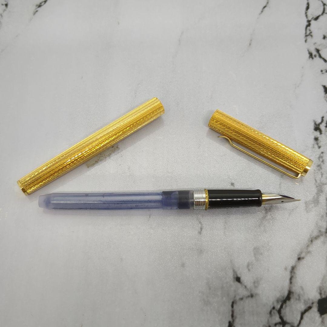 1970s PILOT SUPERLOY gold plated stripe fountain pen with fine nib and embossed cap top from Japan
