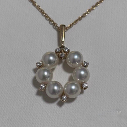Mikimoto K18 yellow gold necklace with pearl and diamond circle motif design