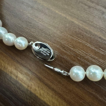 PLUSTER Akoya cultured pearl necklace with 8-8.5mm pearls and matching K14 white gold earrings on white background