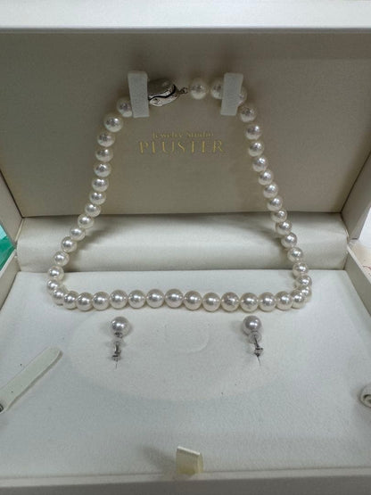 PLUSTER Akoya cultured pearl necklace with 8-8.5mm pearls and matching K14 white gold earrings on white background