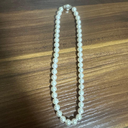 PLUSTER Akoya cultured pearl necklace with 8-8.5mm pearls and matching K14 white gold earrings on white background