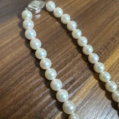 PLUSTER Akoya cultured pearl necklace with 8-8.5mm pearls and matching K14 white gold earrings on white background