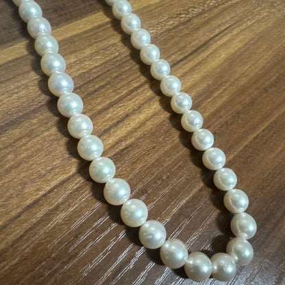 PLUSTER Akoya cultured pearl necklace with 8-8.5mm pearls and matching K14 white gold earrings on white background
