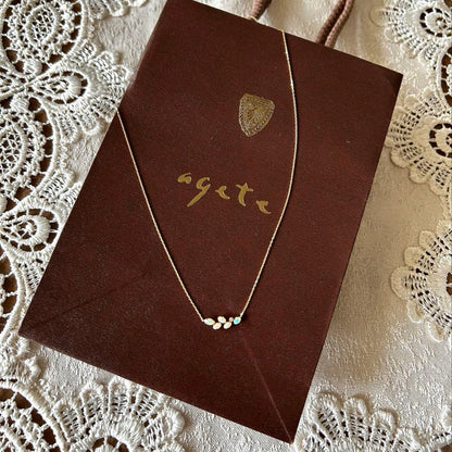 agete K18 Necklace with marquise-cut opals and diamonds set in K18 K14 metal in classic style