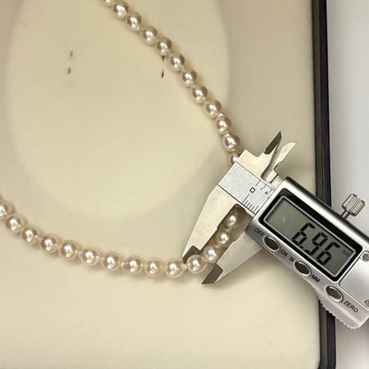 Aqoya pearl necklace with white Akoya pearls sized 6.5-7.0mm on 40cm strand weighing 24 grams