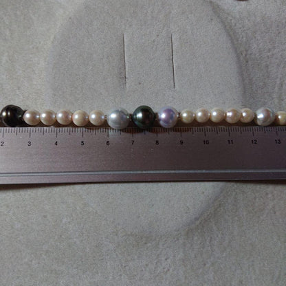 Large Akoya black and untoned pearl semi-long necklace measuring about 62cm with 8-9mm pearls