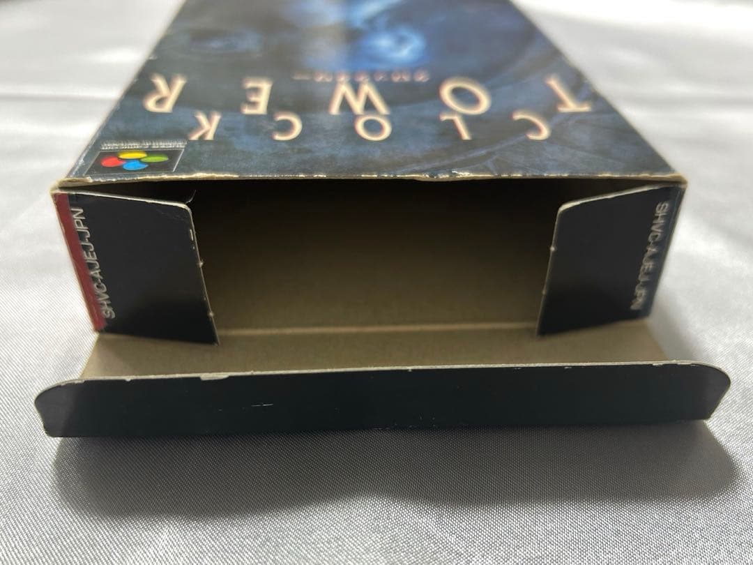 SFC Super Famicom Clock Tower game cartridge with original box showing wear and scratches