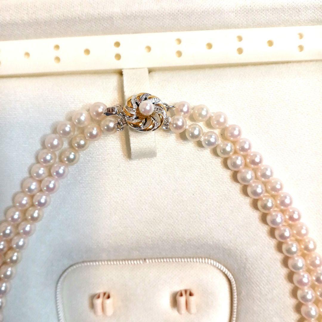 Akoya pearl double strand necklace with round pearls sized 5.5 to 5.8 mm and silver gold clasp