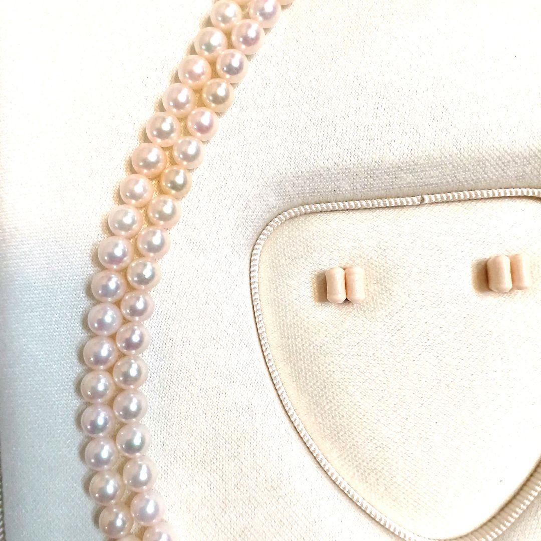 Akoya pearl double strand necklace with round pearls sized 5.5 to 5.8 mm and silver gold clasp