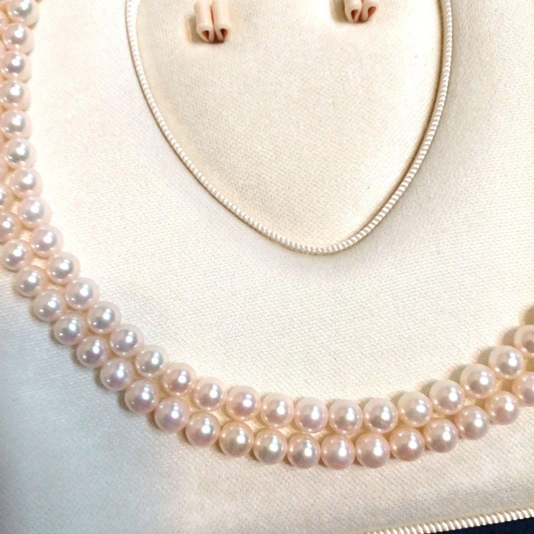 Akoya pearl double strand necklace with round pearls sized 5.5 to 5.8 mm and silver gold clasp