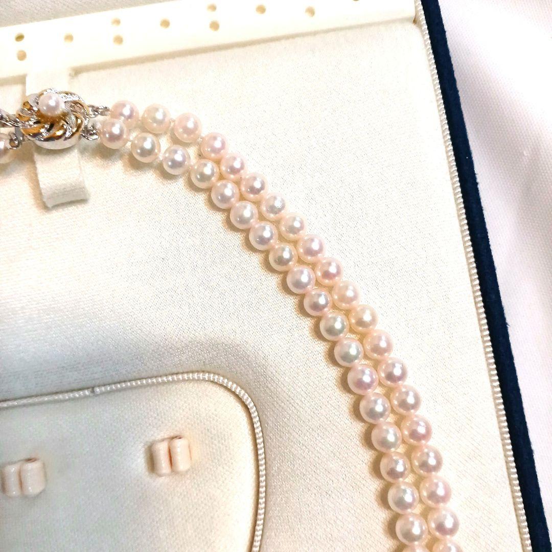 Akoya pearl double strand necklace with round pearls sized 5.5 to 5.8 mm and silver gold clasp