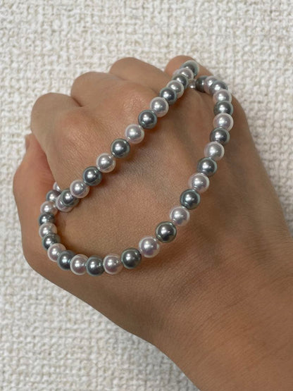 Akoya pearl necklace with bicolor blue and white pearls sized 6-6.5mm, approximately 42cm long