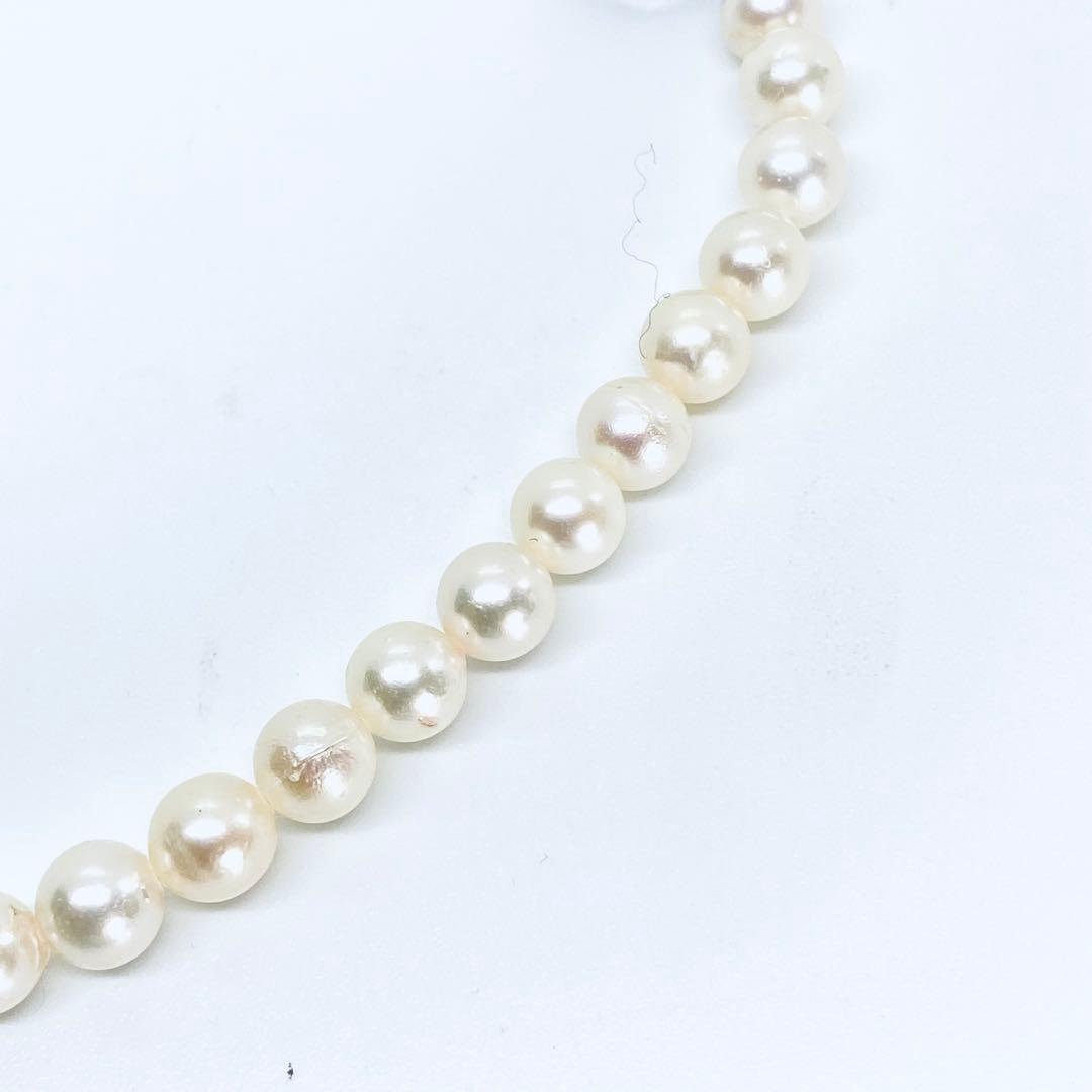 Akoya pearl necklace with 7mm-8mm white and cream round pearls, 44cm length, silver bead one-touch clasp