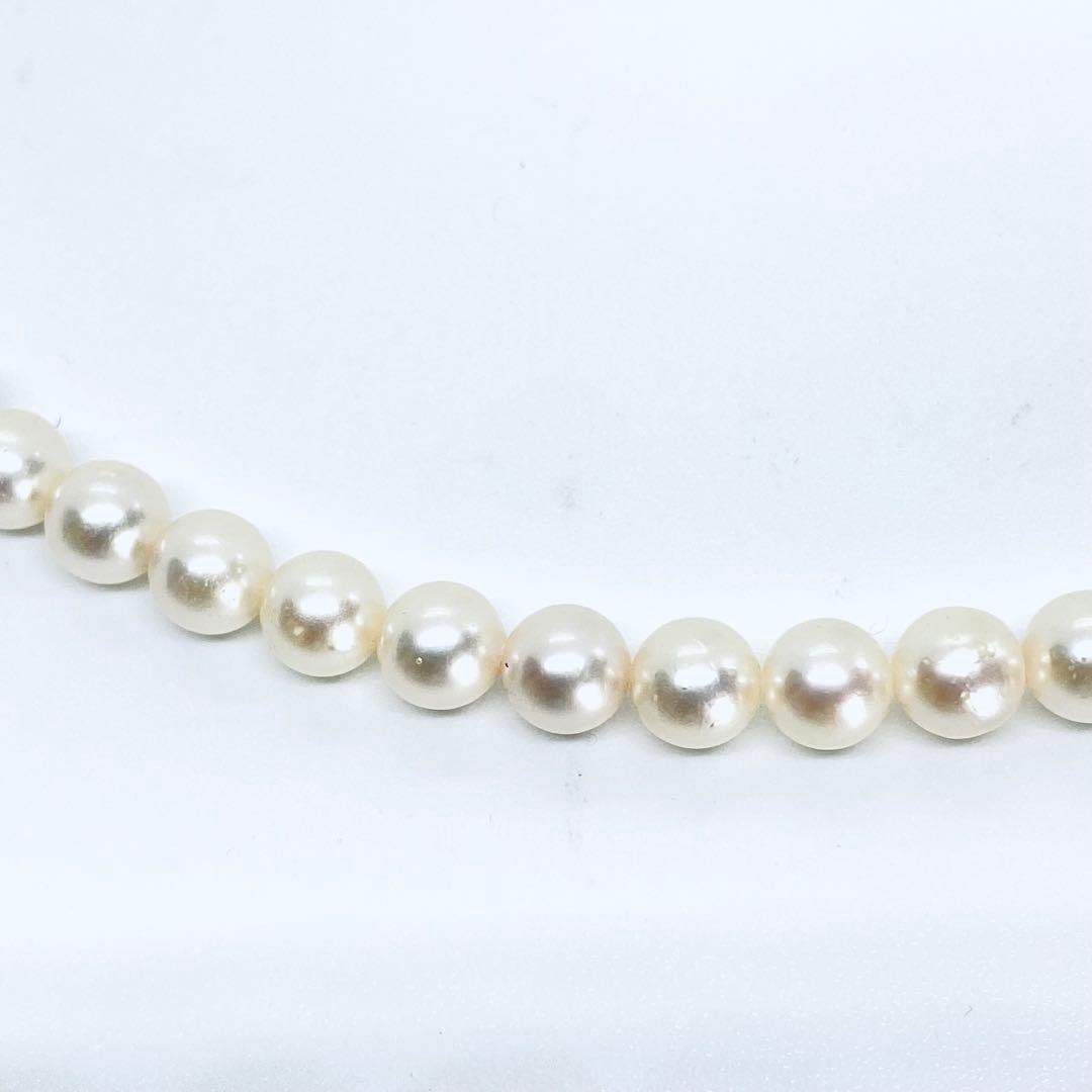 Akoya pearl necklace with 7mm-8mm white and cream round pearls, 44cm length, silver bead one-touch clasp