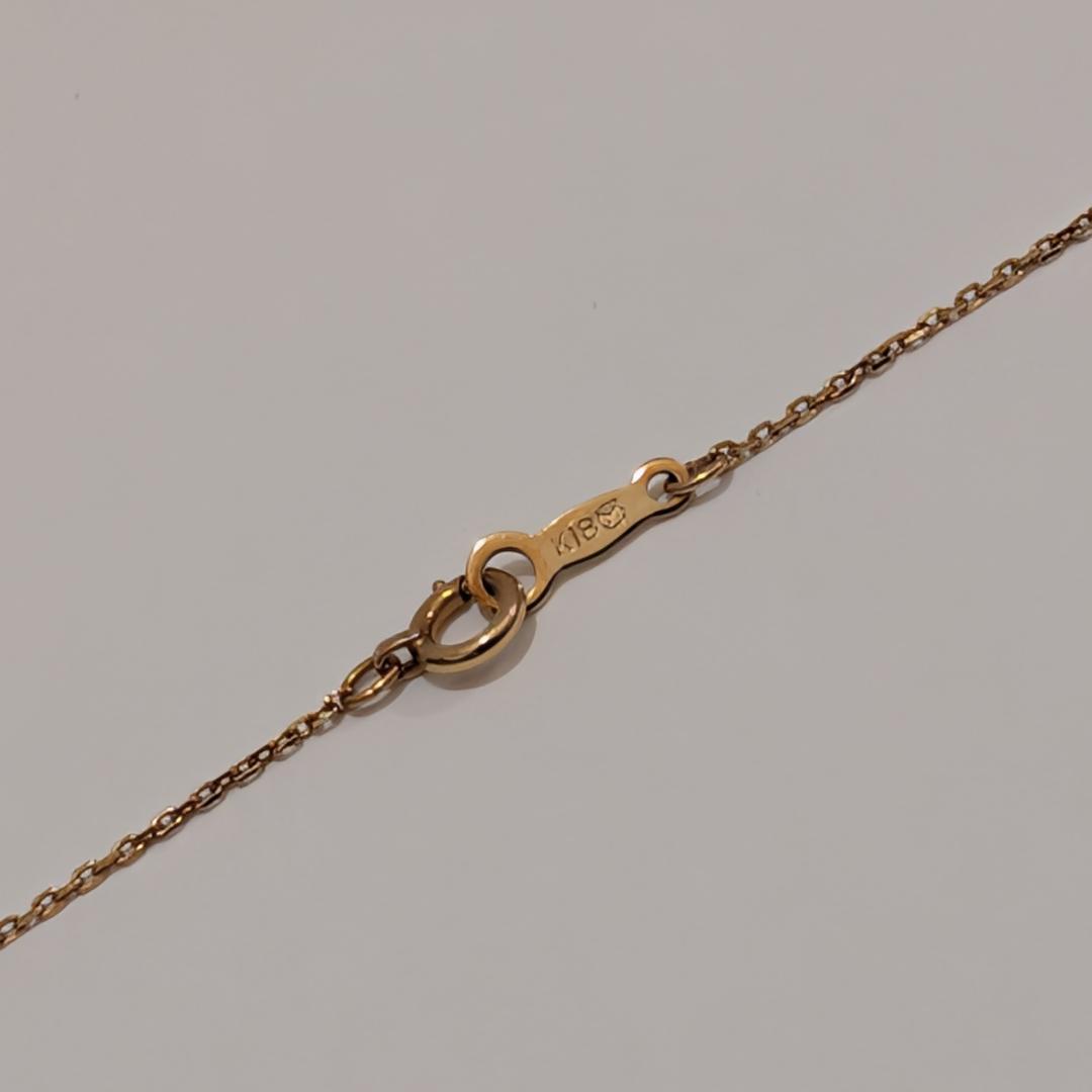 Mikimoto yellow gold necklace featuring a 7mm pearl and diamond pendant with 40cm chain