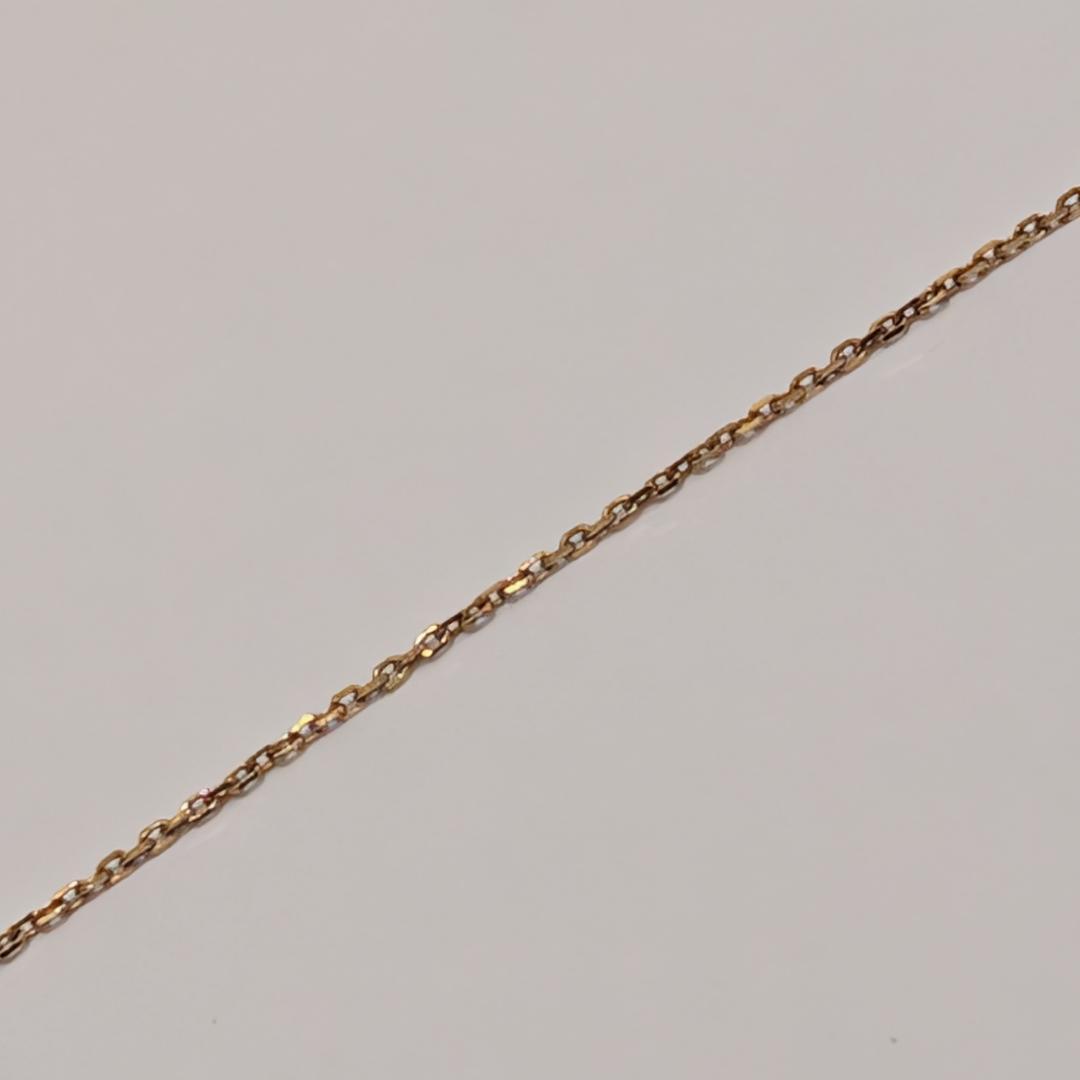 Mikimoto yellow gold necklace featuring a 7mm pearl and diamond pendant with 40cm chain
