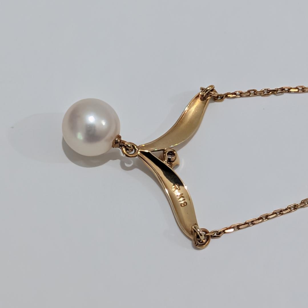 Mikimoto yellow gold necklace featuring a 7mm pearl and diamond pendant with 40cm chain