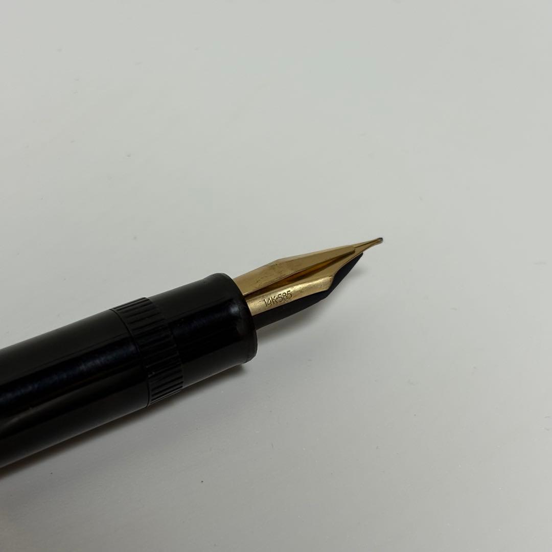 Used PILOT Justus 14K 585 fine point fountain pen with 14K gold nib and some signs of wear