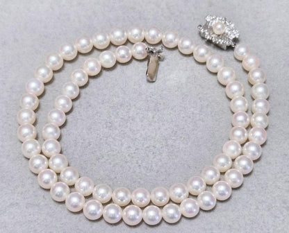 Mikimoto genuine pearl necklace about 42 centimeters long with 6 millimeter round pearls