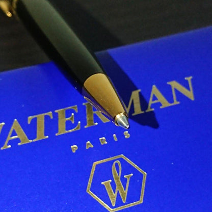 WATERMAN Expert Ballpoint Pen in black with gold trim, 143mm length, shown against white background