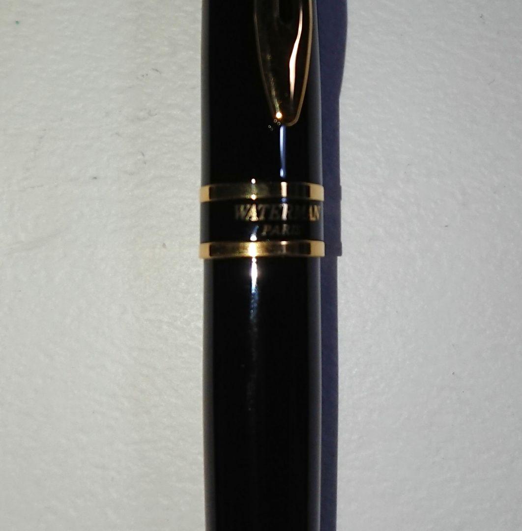 WATERMAN Expert Ballpoint Pen in black with gold trim, 143mm length, shown against white background