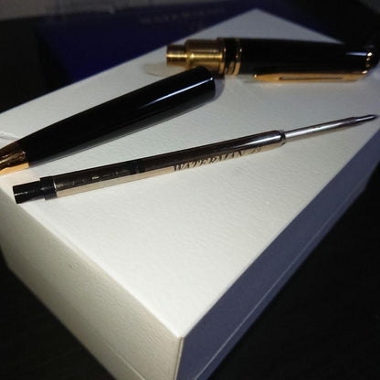 WATERMAN Expert Ballpoint Pen in black with gold trim, 143mm length, shown against white background